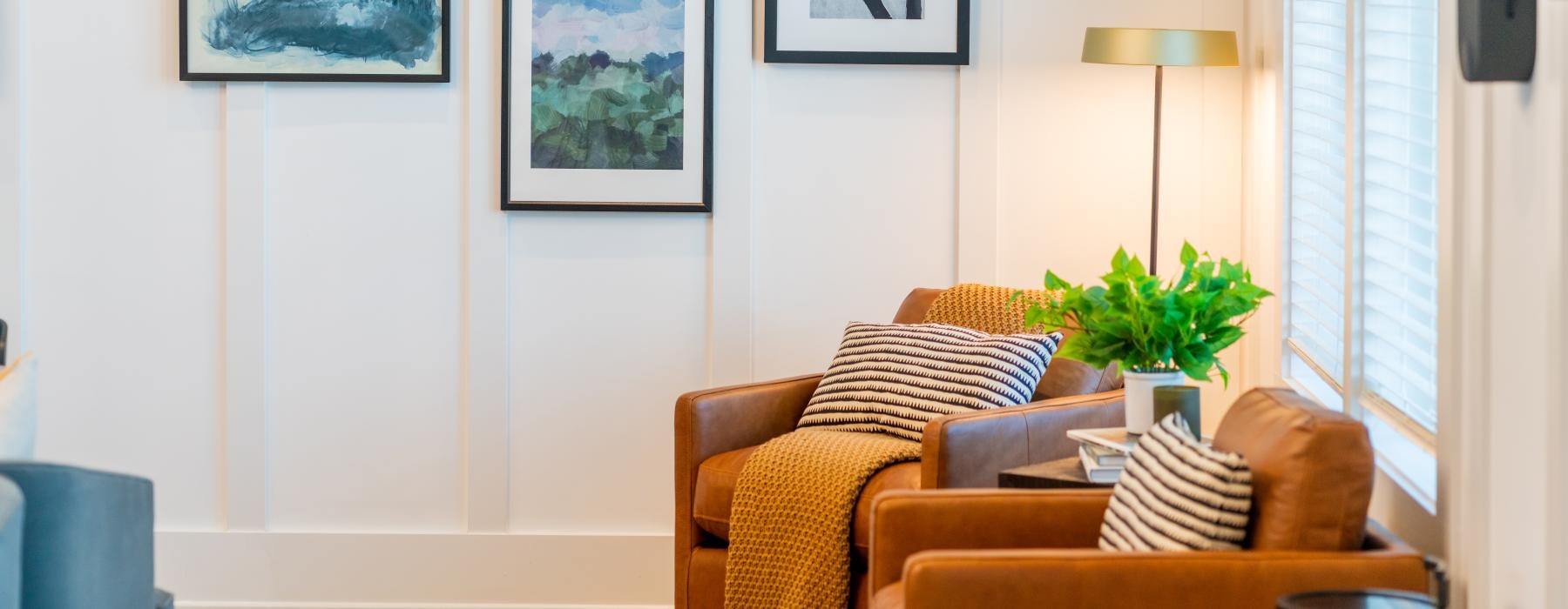 a living room with a couch and a table