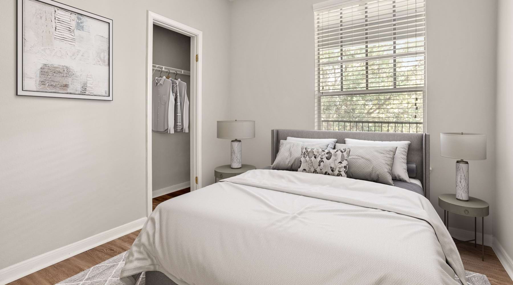 a bedroom with a bed and a closet
