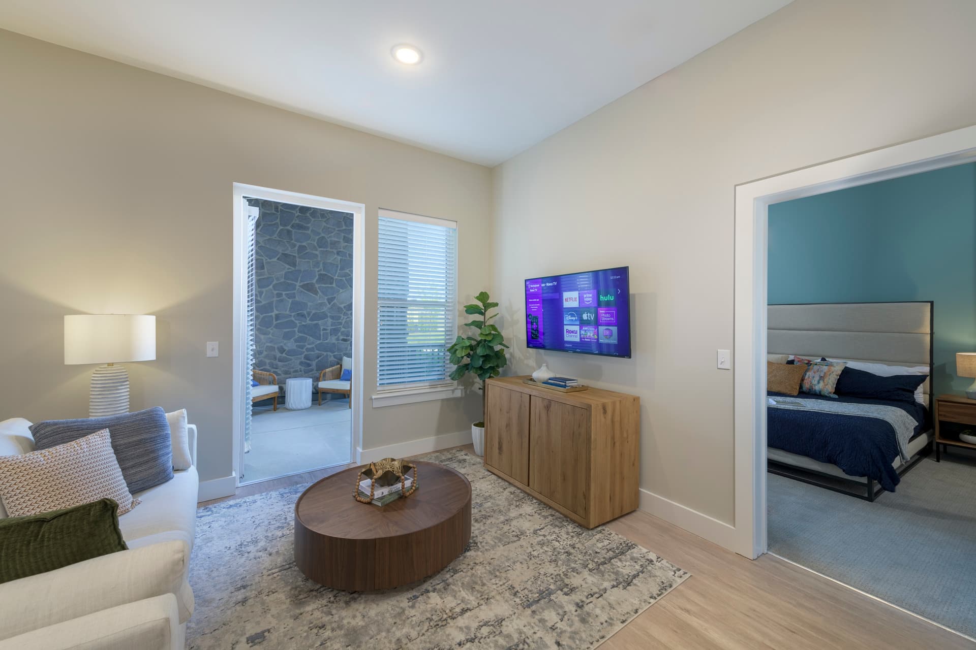 Atlee Square living room with patio entrance
