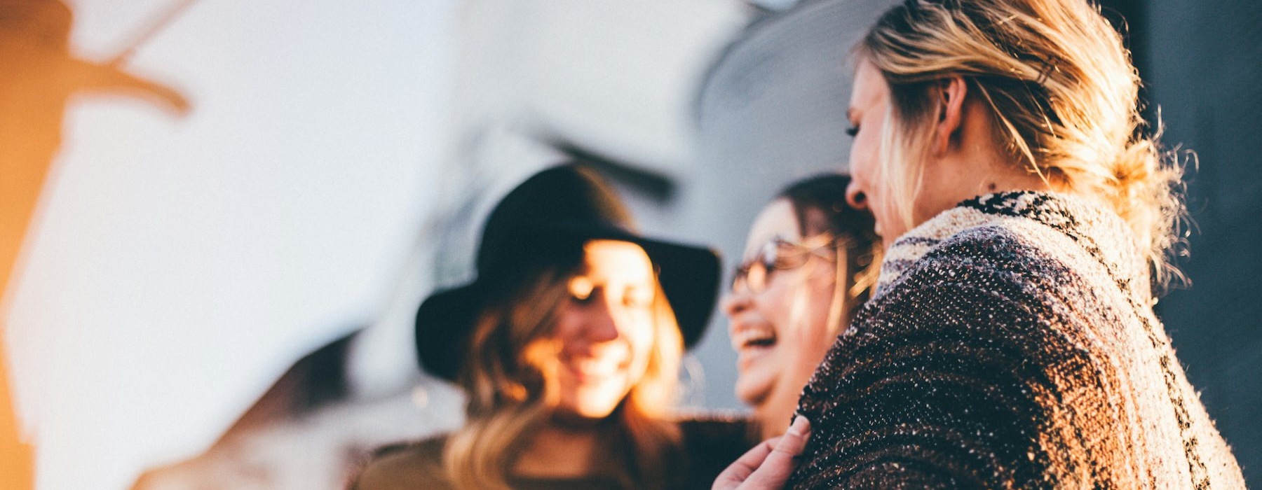 three women laughing