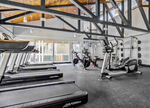 Fitness center with exercise equipment at Reserve at Providence apartments in Charlotte near Matthews, NC