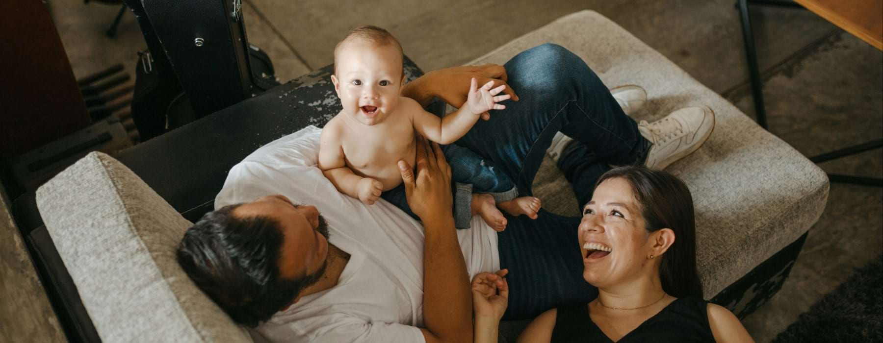 family laughing in apartment