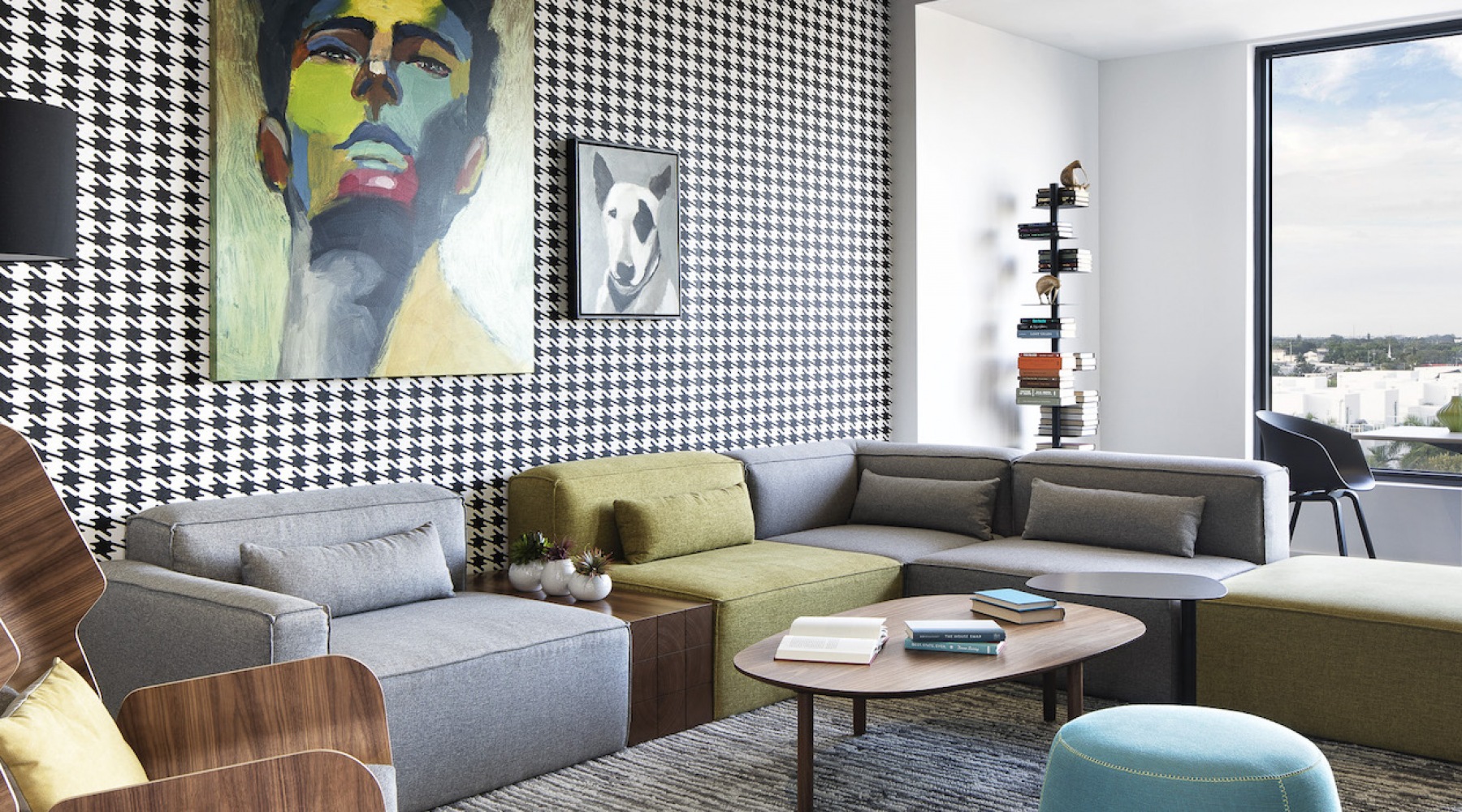 living room with large open spaces and excellent lighting from large window/patio doors