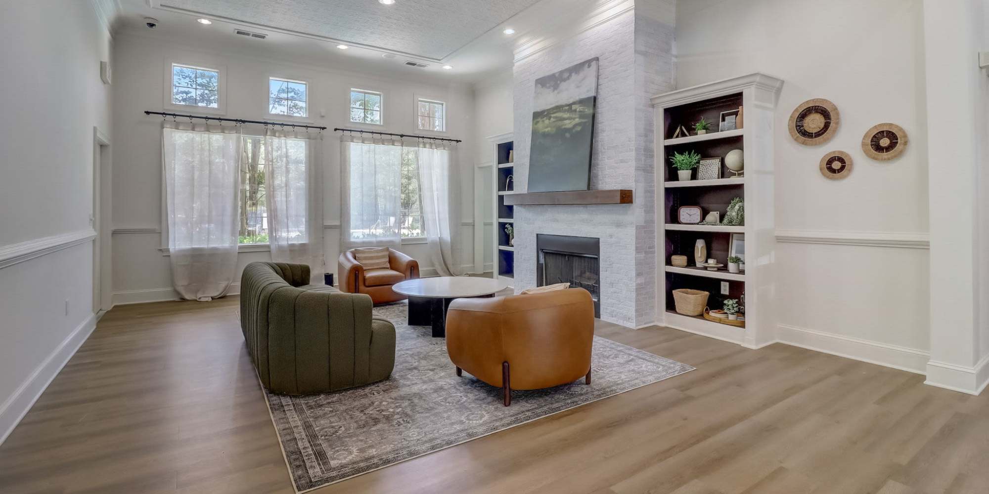 Spacious living room with fireplace at Parkway Grand, Decatur in GA