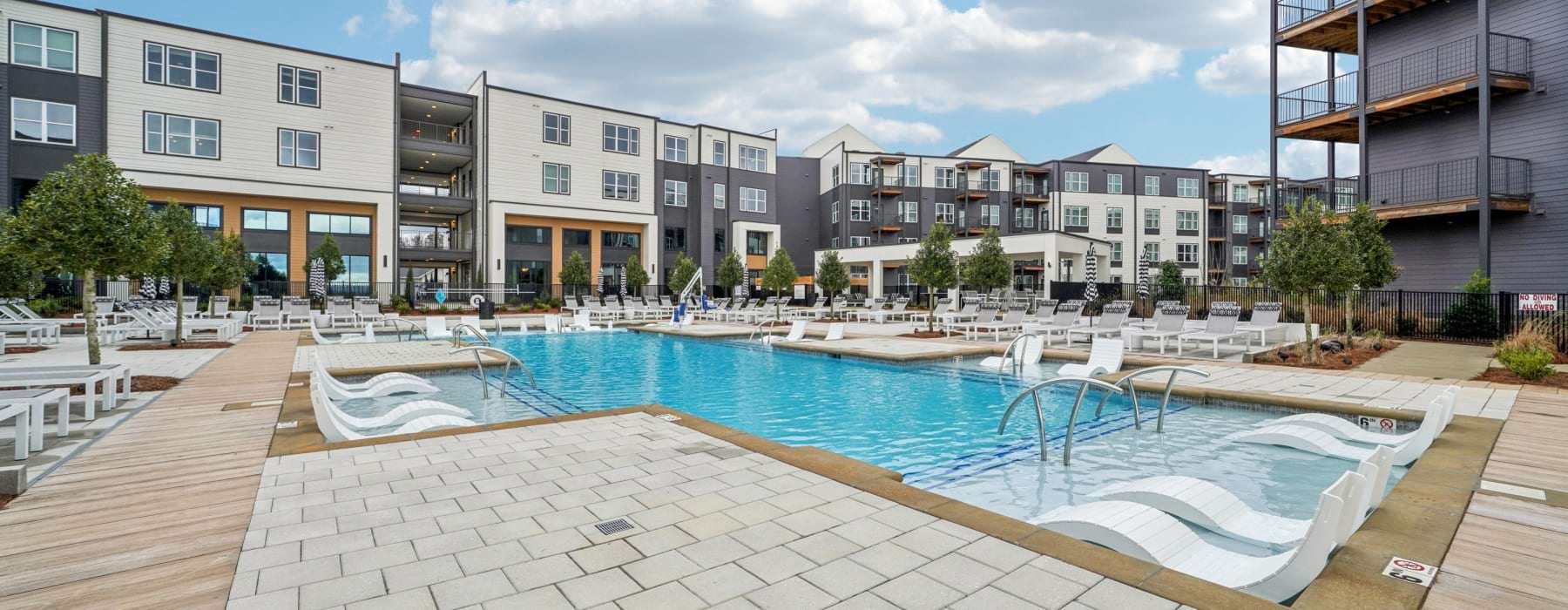 Resort style pool with sundeck at Colina Hillside in Hoover, AL