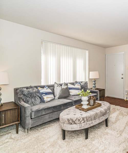 Living room with window at Pear Tree in Saint Ann,Missouri