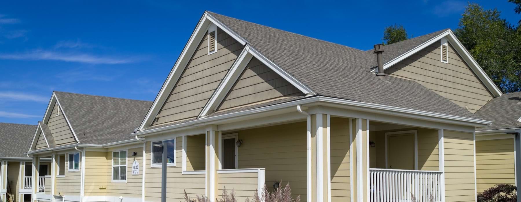 a building with yellow siding