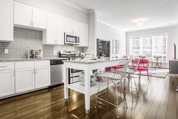 Stylish gourmet kitchens with travertine backsplashes - The Perry