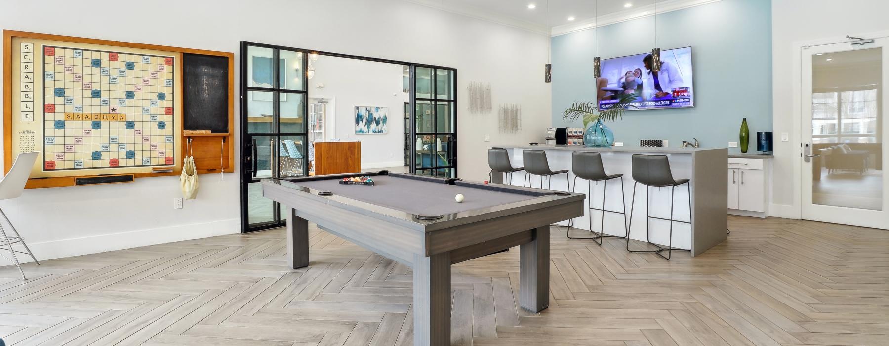a room with a table and chairs