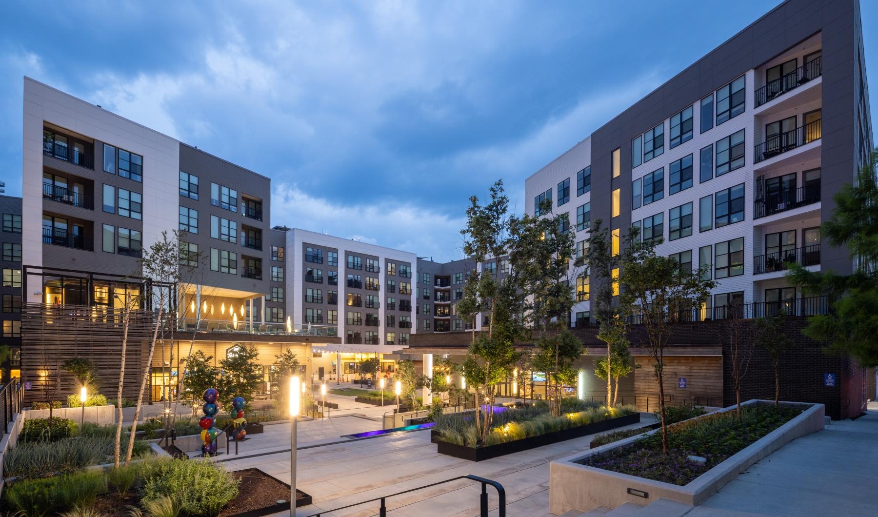 a courtyard with buildings around it