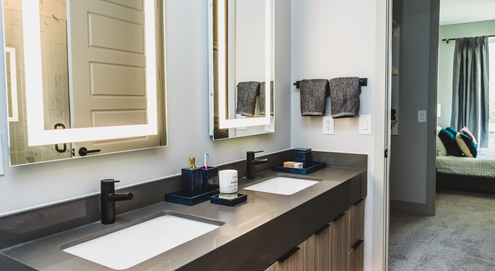a bathroom with a sink and mirror