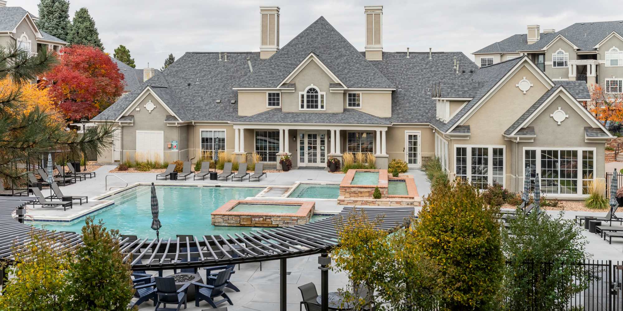 Swimming pool and outdoor lounge view at Greenwood Plaza in Centennial, Colorado