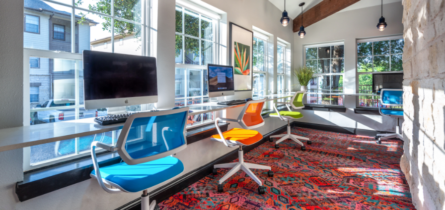 Computer lounge with several desktop computers