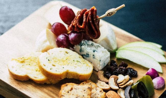 a plate of food, charcuterie board