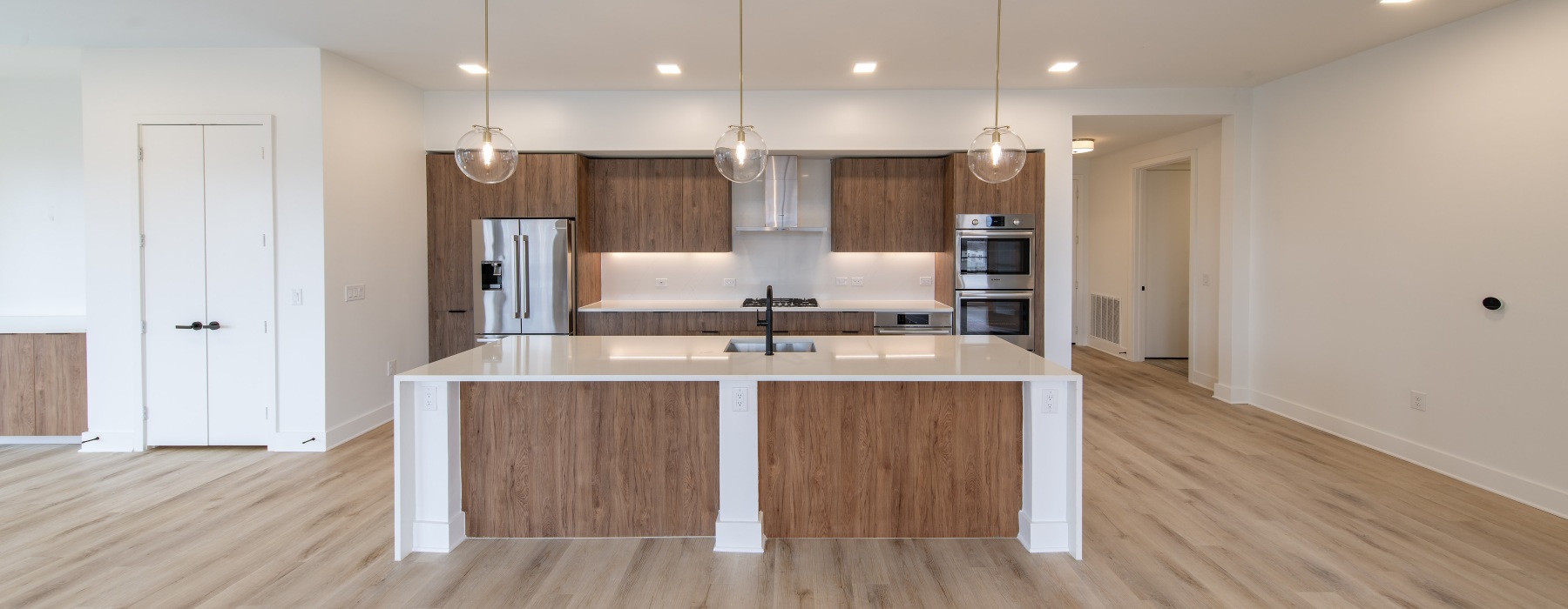 large kitchen island with pendant lighting
