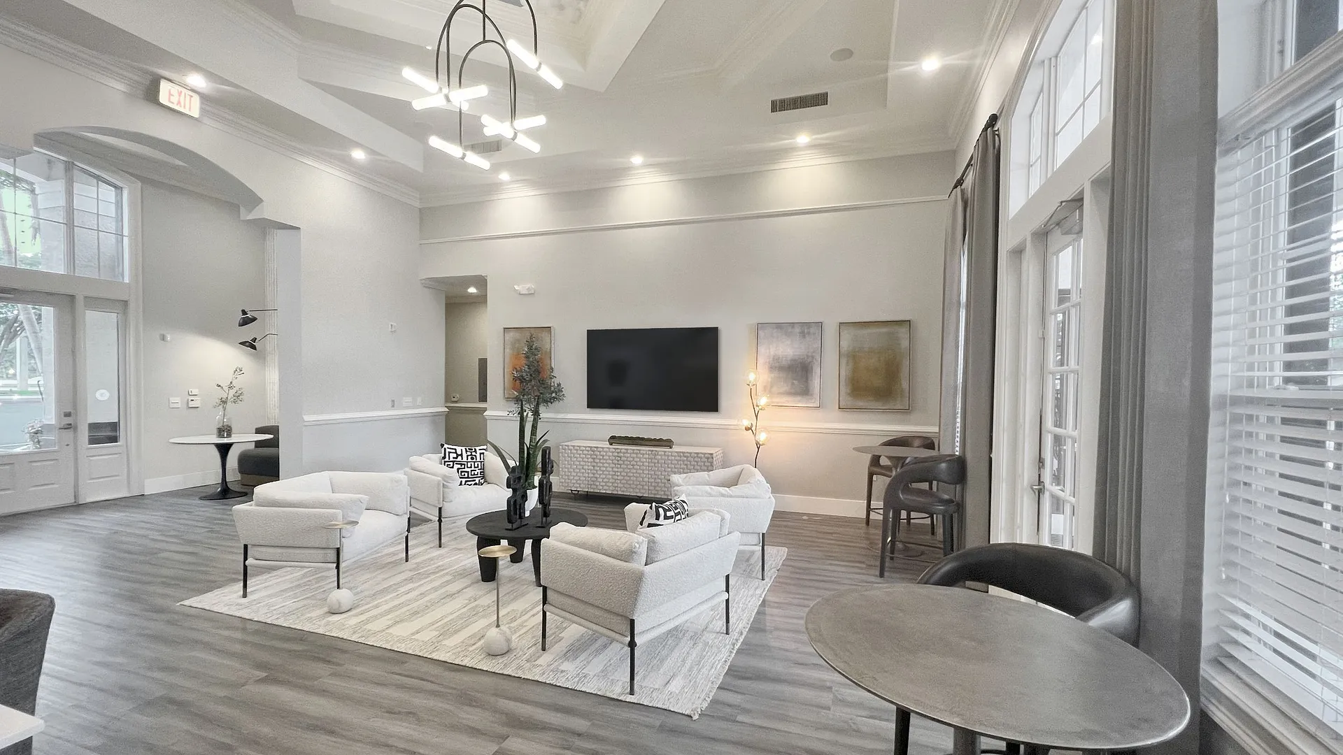 Lounge area with seating and television