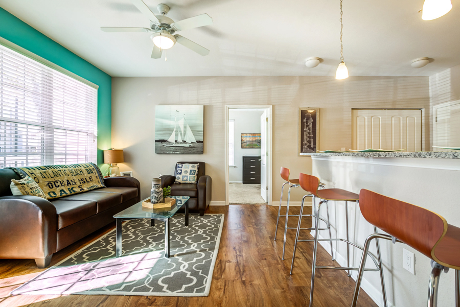 the-nest-wilmington fully furnished living room and breakfast bar