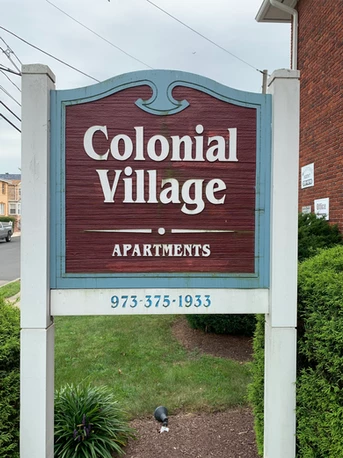 Picture of Colonial Village leasing sign