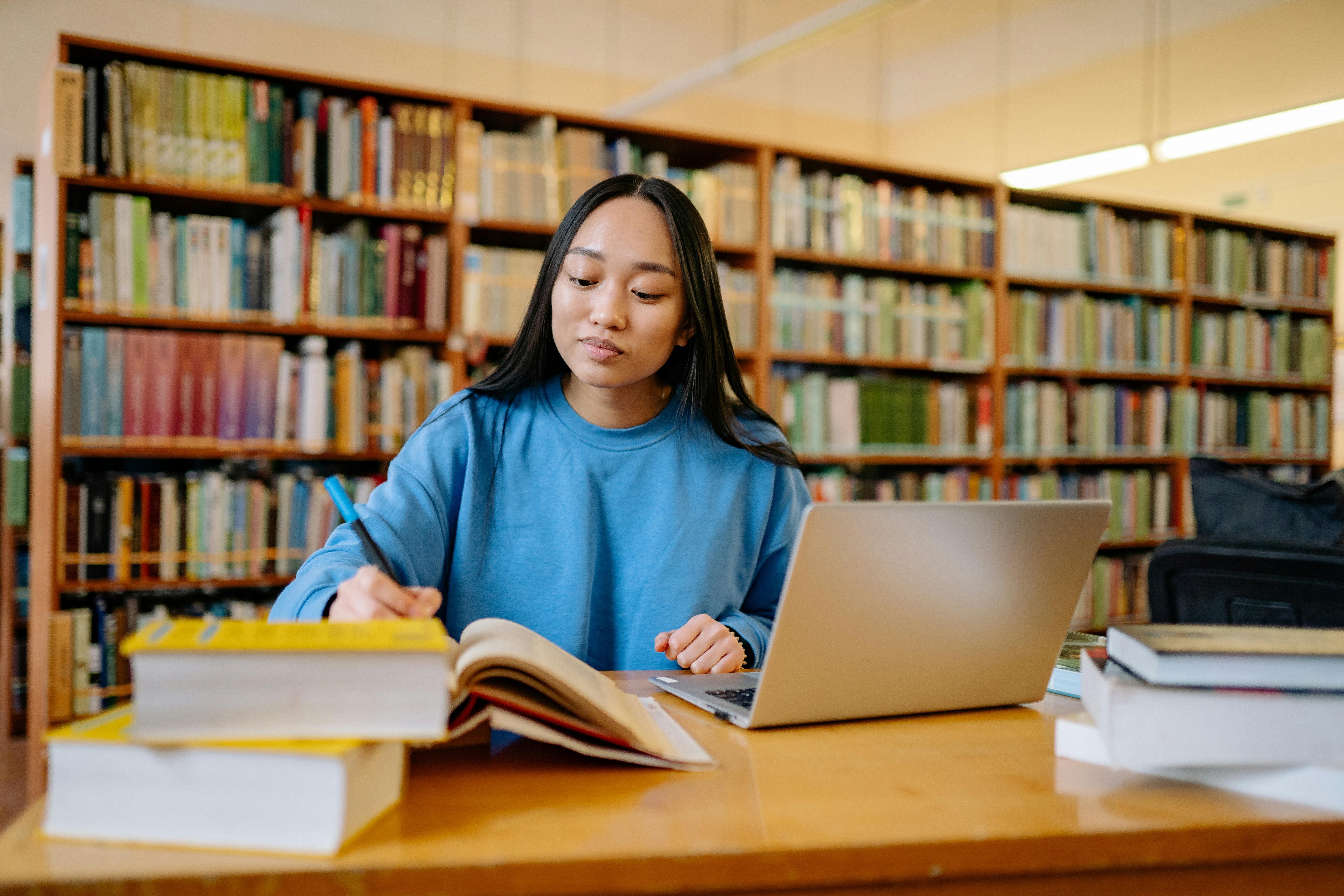 College student in library stock photo