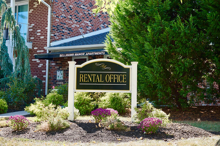 Picture of leasing office sign
