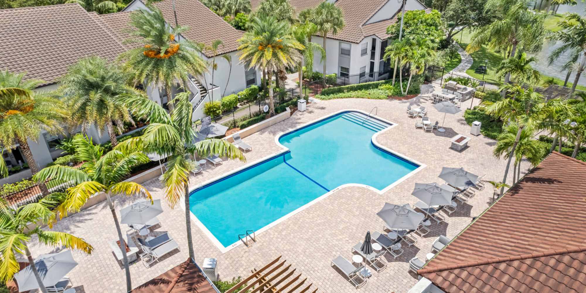 Aerial view of the swimming pool at Centro at Davie Apartments in Davie, Florida
