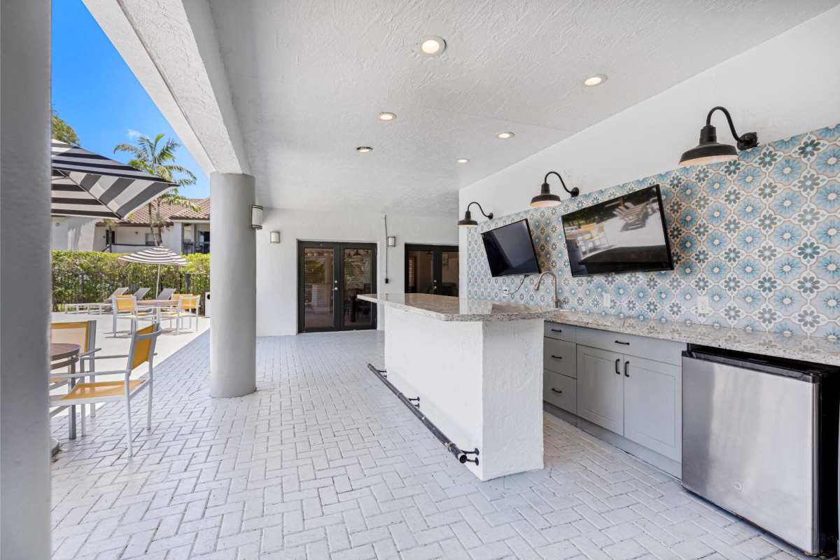 Summer Kitchen & Outdoor Lounge  at Centro at Davie Apartments, Davie, Florida