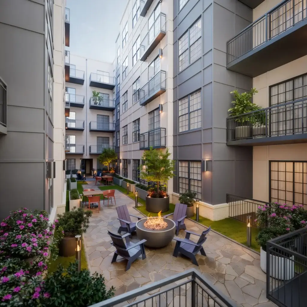 signature on grand apartments courtyard with fire pit