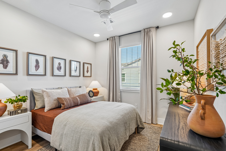 bedroom at HARMON Ascend with white bedside tables