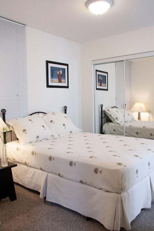 bed with a white comforter  at Great Northern, Missoula, 59808