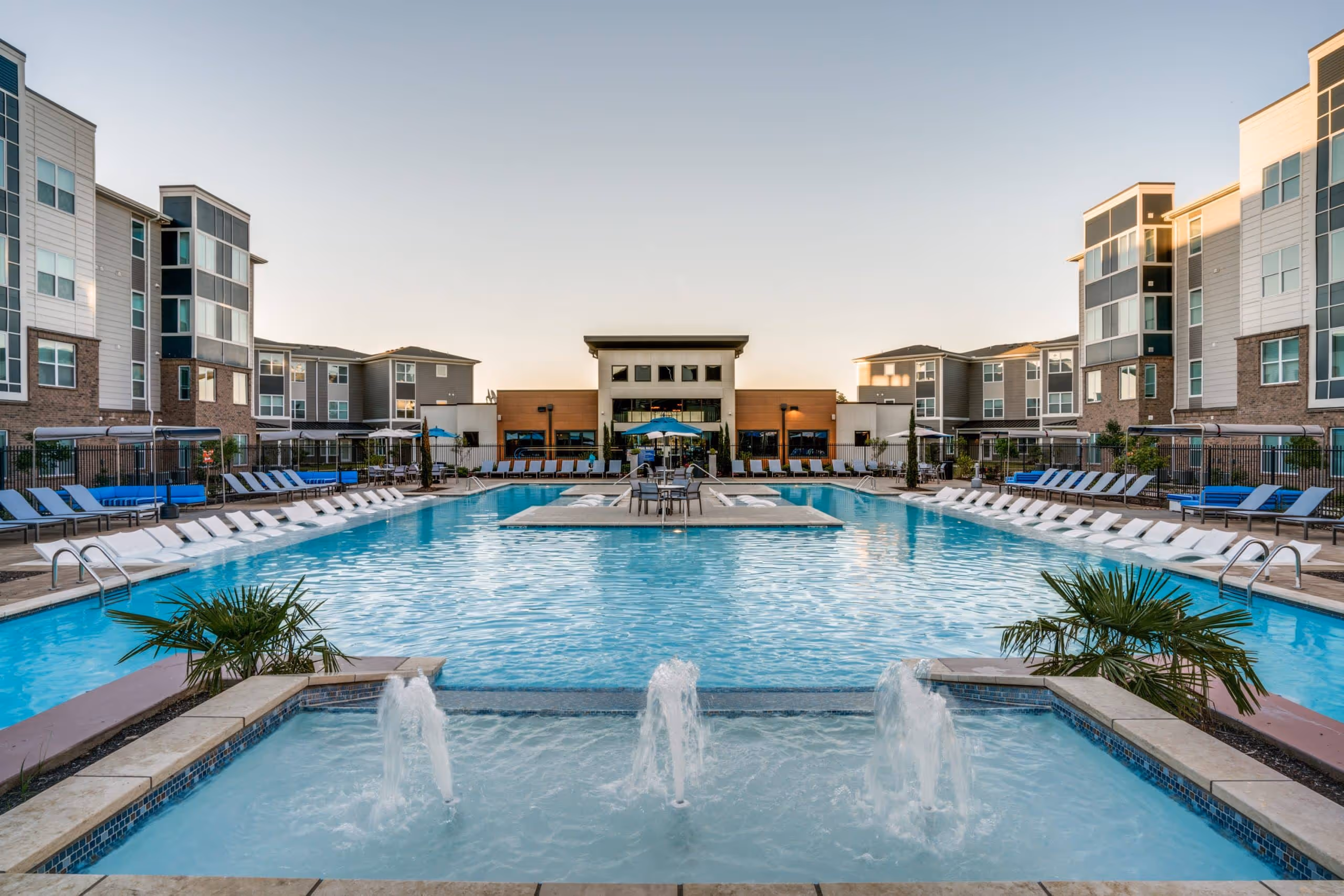 swimming pool with lounge chairs