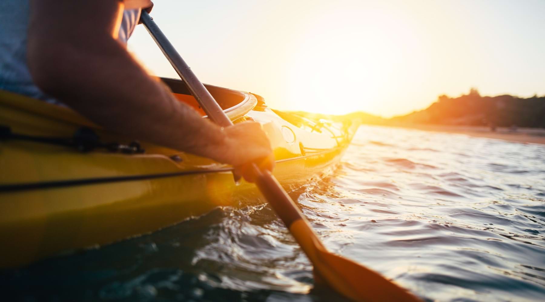 Person kayaking in the river