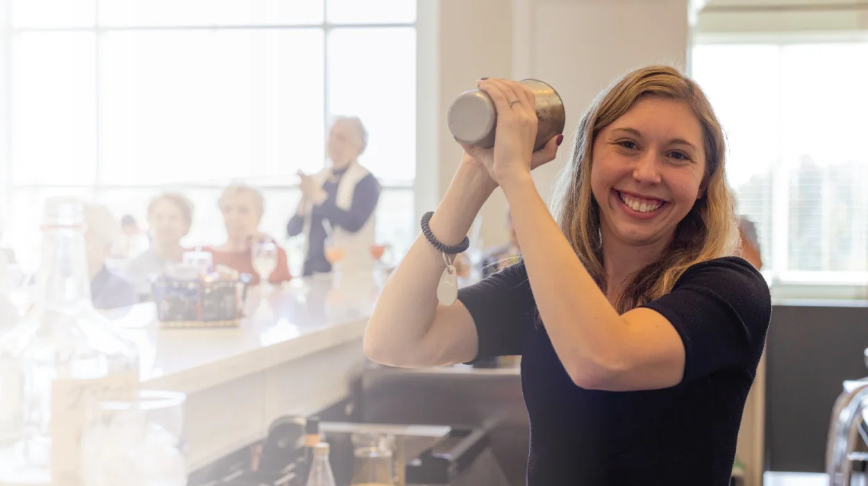 Delaney bartender at work, shaking a drink
