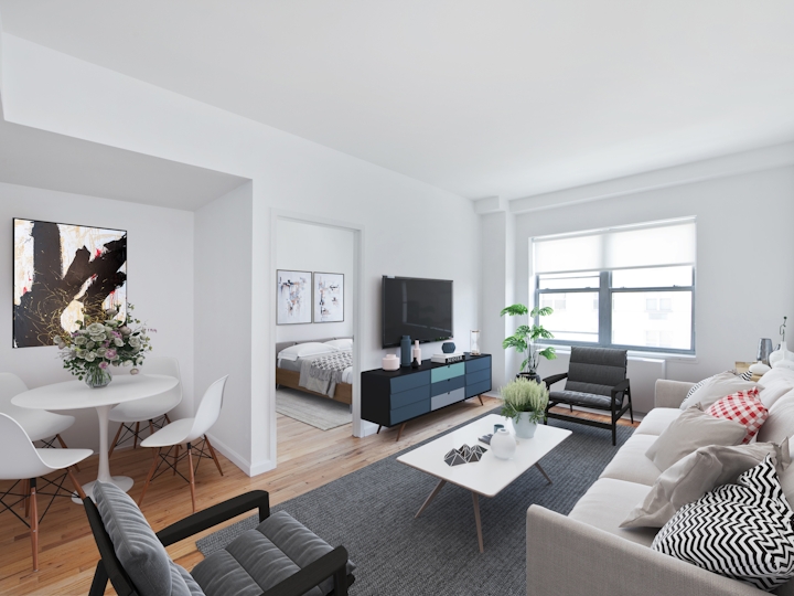 a living room filled with furniture and a large window