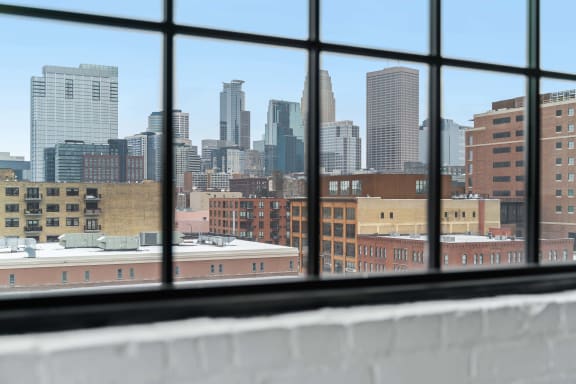 the view of the city skyline from a window