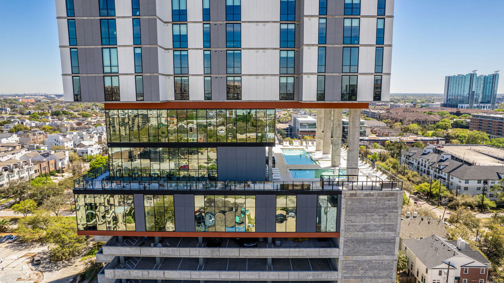 Modern high-rise Hermann Park apartments in Houston with pool