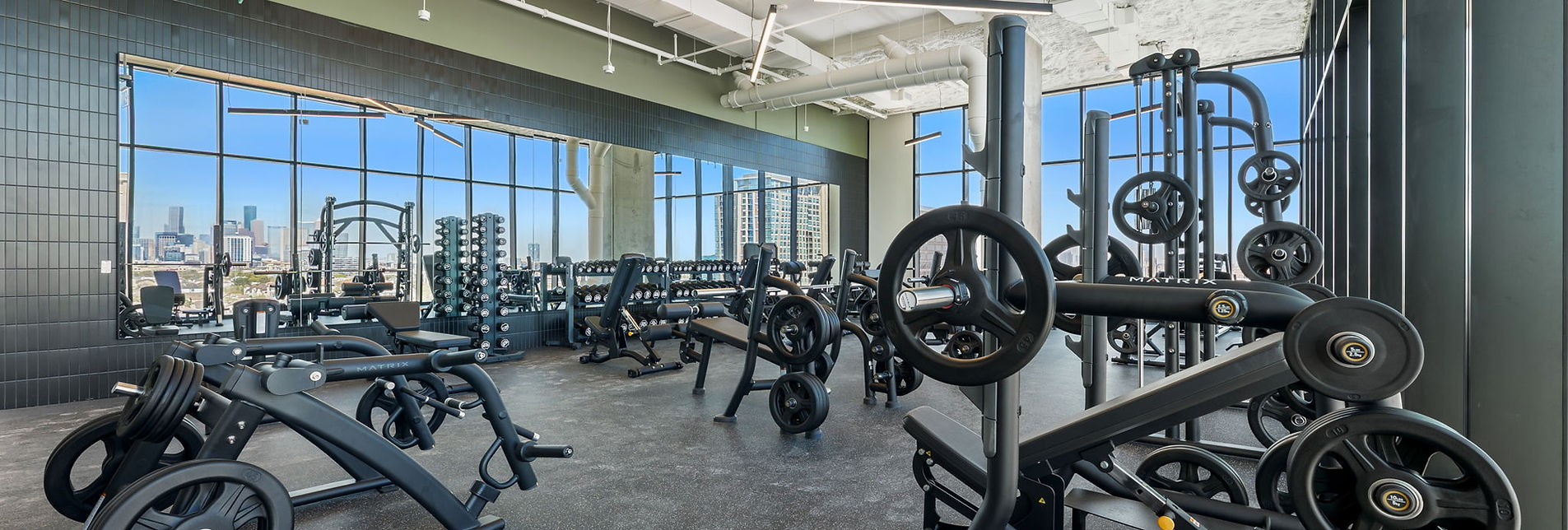 Modern fitness center at Hermann Park apartments Houston