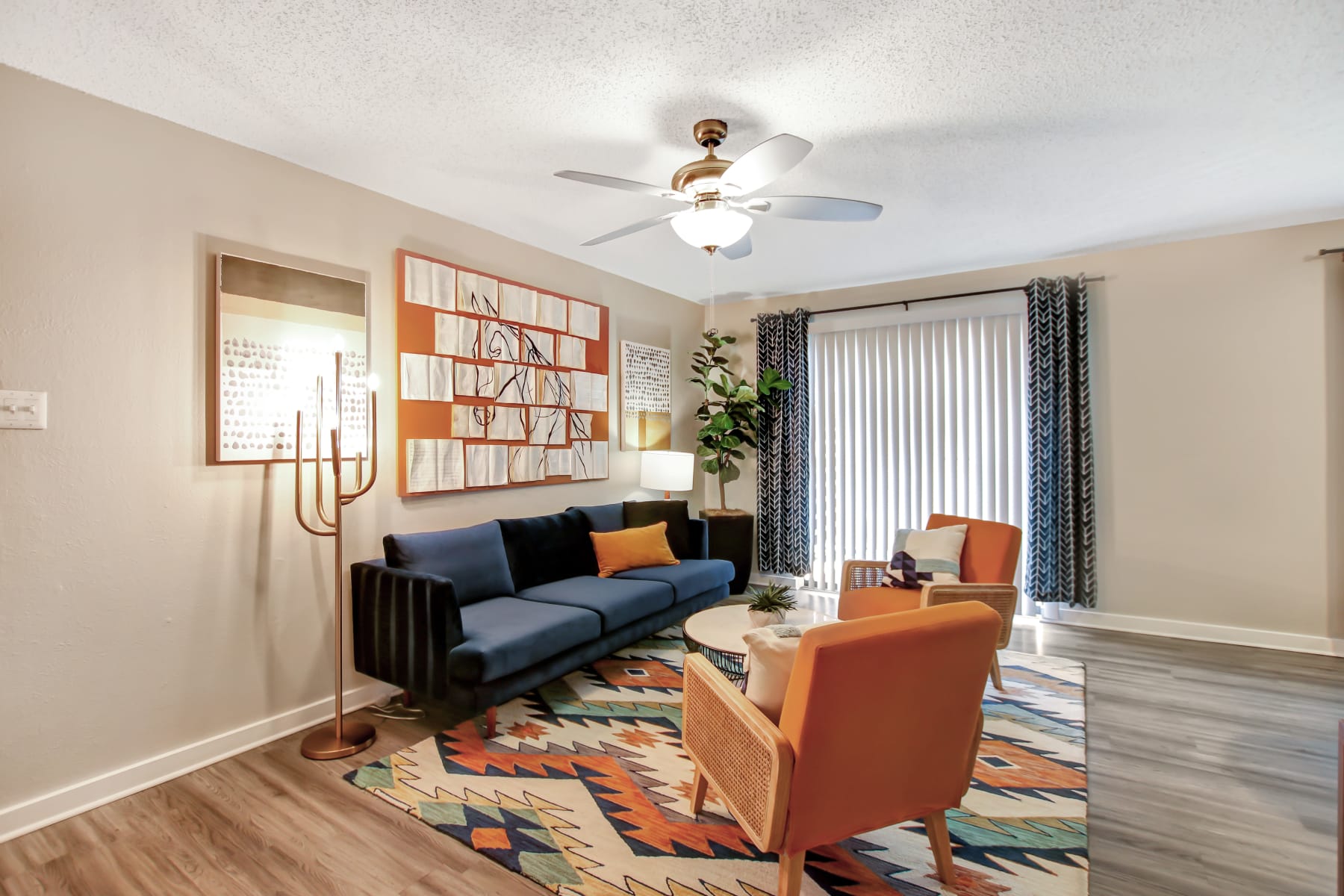 Plush and comfortable living room at Lockhart Apartment Homes in Mesquite, Texas