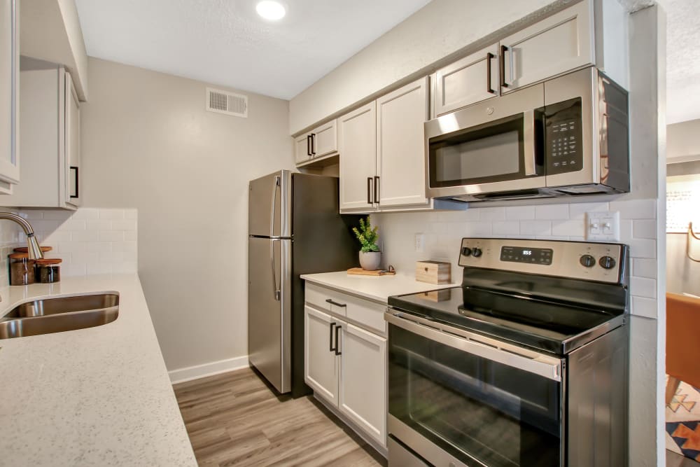Stainless steel appliance kitchen at Lockhart Apartment Homes in Mesquite, Texas