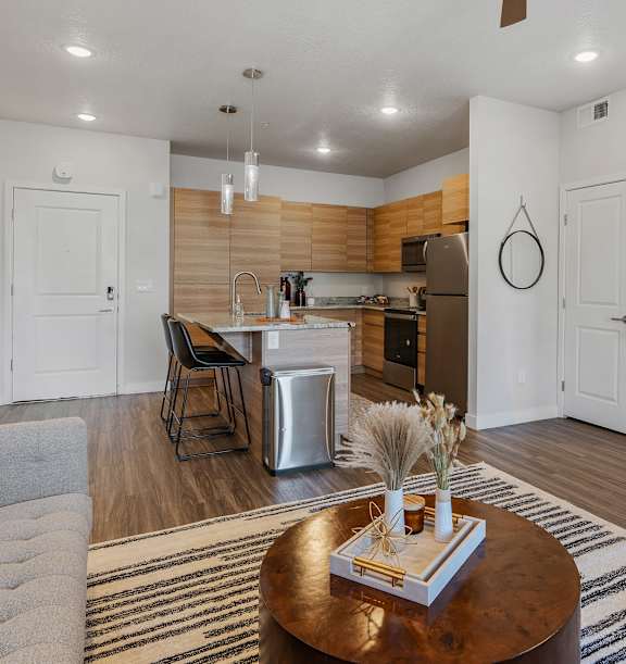 Kitchen with an Island and Stools at The Flats at Riverwoods, Utah, 84604