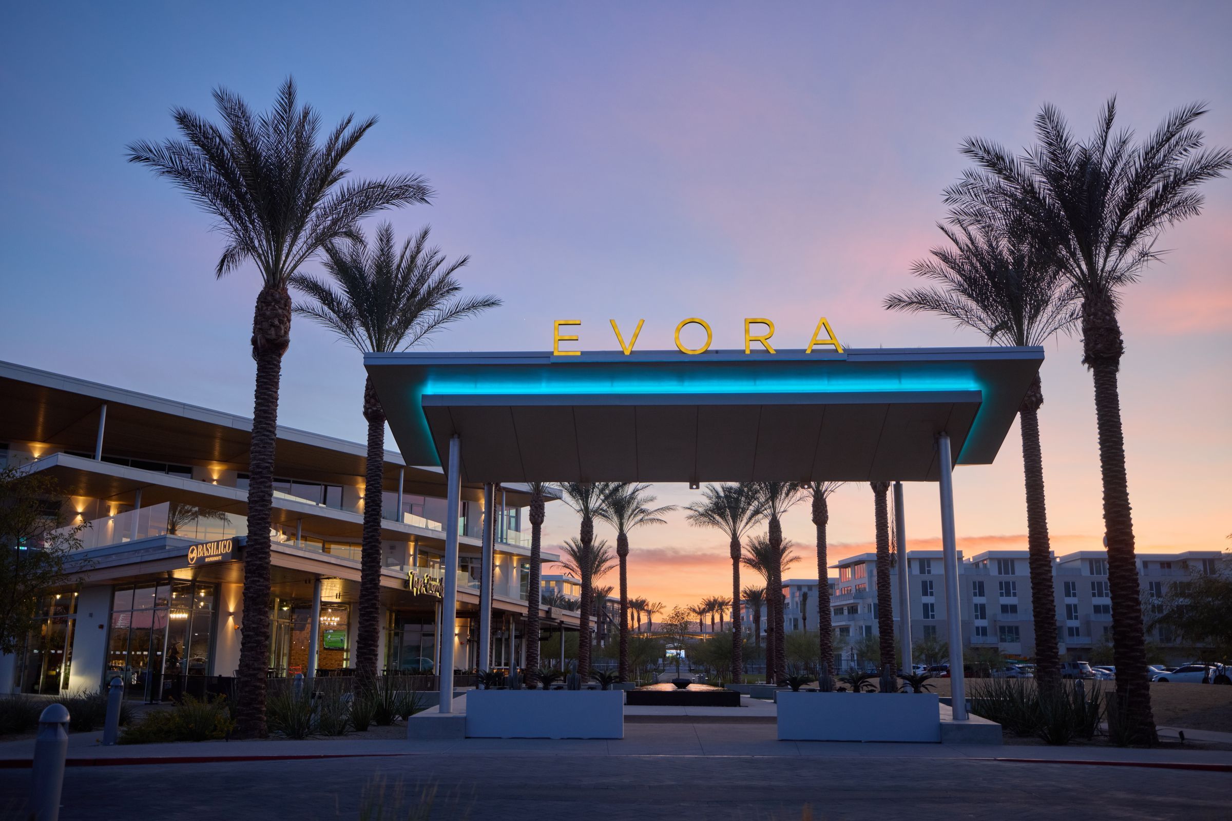 A stunning view of Évora, a luxury resort nestled in the serene desert landscape, showcasing elegance and tranquility.