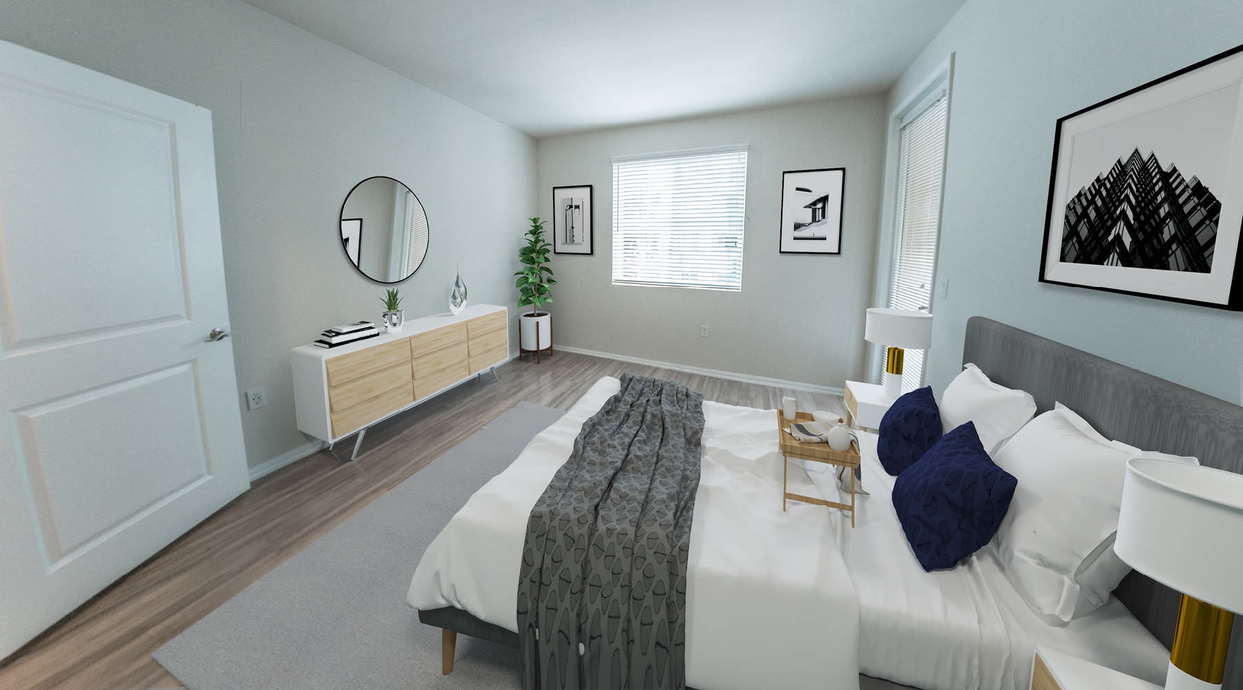 a bedroom with a bed and a mirror