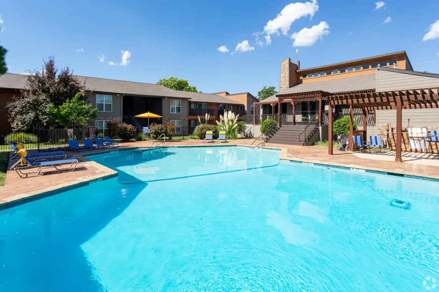 a sparkling resort-style swimming pool with crisp clean water