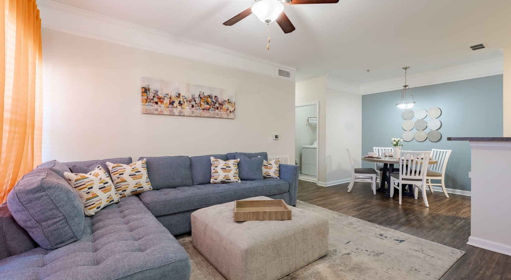 living area that includes ample seating spaces and bright lighting