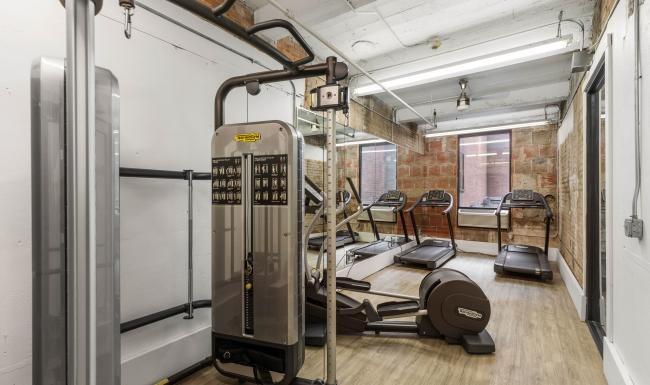 a room with a treadmill and treadmills