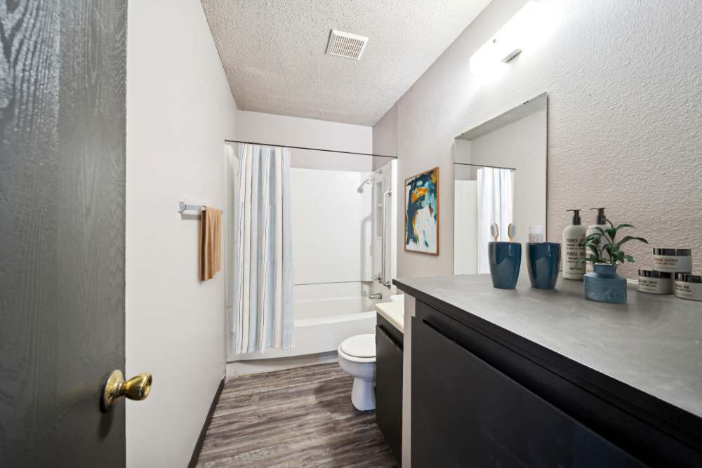 Spacious Bathroom with vanity and tub at Sherwood Pointe Apartments in Shawnee, Oklahoma