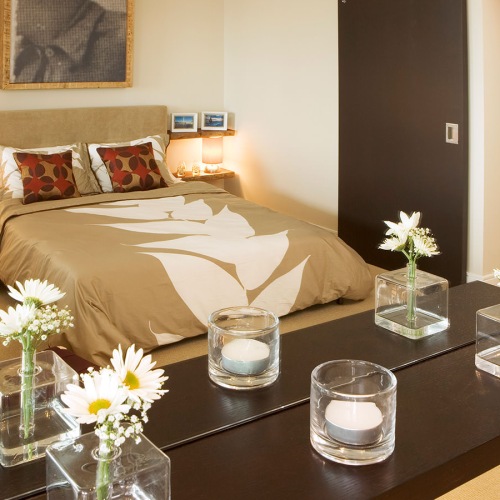 carpeted bedroom with walk-in closet