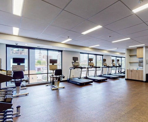 A gym with treadmills, exercise bikes, and other equipment. at The Arlow on Kellog, Minnesota, 55102