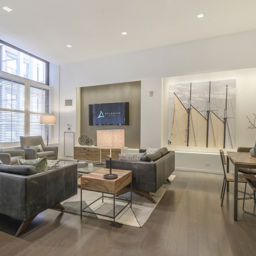 large, picture windows brighten spacious clubroom lounge