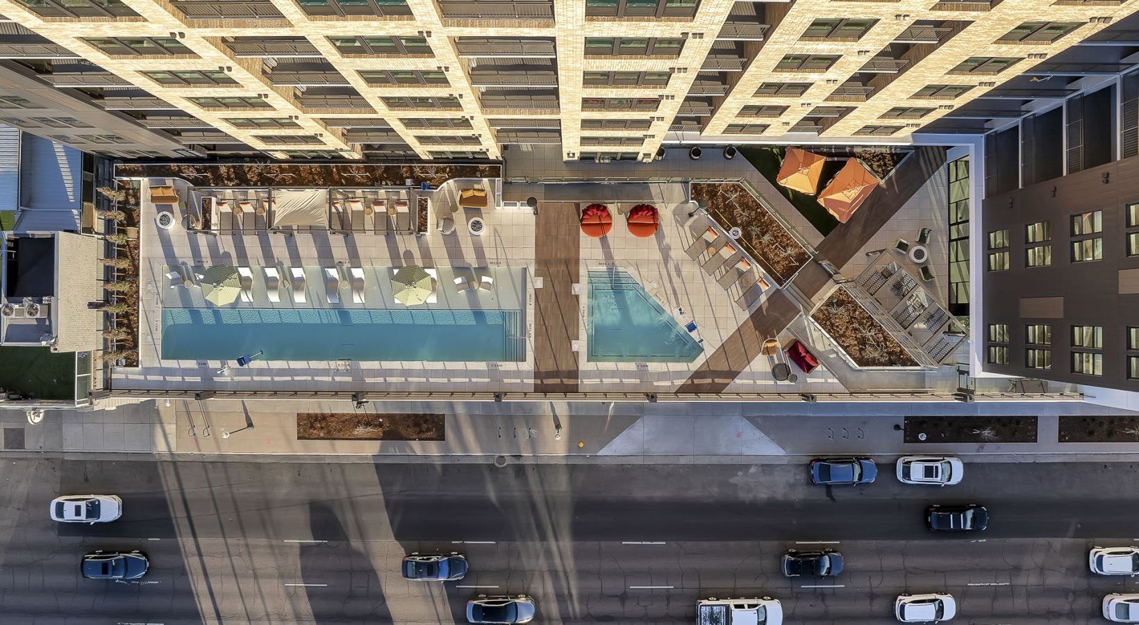 Resort-Style Pool Deck with Year-round Pool and Hot Tub