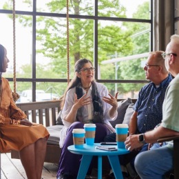 A group of Signal House residents sitting around talking